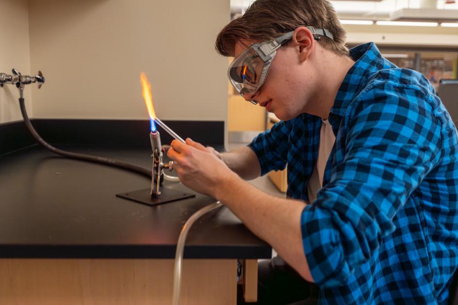 Students in Professor John Kirk's class learn about chemistry through glass blowing.